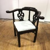 An unusual George III Scots laburnum corner chair, the scroll arms and pierced vasiform splat