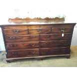 A George III mahogany dresser base incorporating a mule chest, last quarter of the 18th century, the