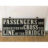 Railwayana: a cast iron sign, "Passengers are Requested to Cross the Line by the Bridge". 47cm by