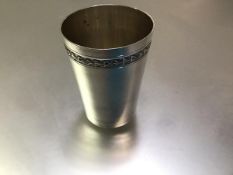 A Continental 800 silver beaker, early 20th century, with gilt interior and chased near the rim with