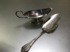 A German 800 silver sauce boat, early 20th century, of navette form, with loop handle and conforming
