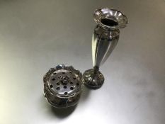 A German 800 silver bud vase, c. 1900, with everted scalloped rim, on a weighted circular domed