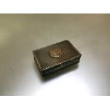 An early Victorian silver snuff box, London 1846, (maker's mark indistinct), the cover with engine-