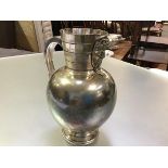 A striking 19th century electro-plated water jug, Martin Hall & Co, of spherical form, with tapering
