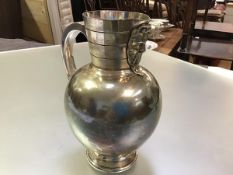 A striking 19th century electro-plated water jug, Martin Hall & Co, of spherical form, with tapering