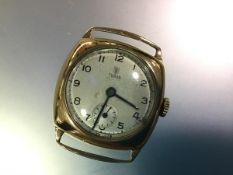 A vintage gentleman's 9ct gold Tudor (Rolex) wristwatch, the circular silvered dial with Arabic