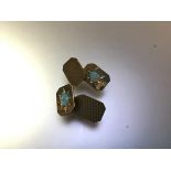 A pair of opal-set 9ct gold chainlink cufflinks, each rectangular plaque with cut-off corners and