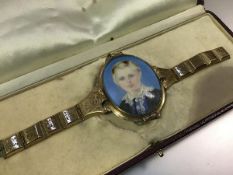 A striking mid-19th century bracelet incorporating a portrait miniature of Master Edward Bird (en