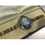 A striking mid-19th century bracelet incorporating a portrait miniature of Master Edward Bird (en