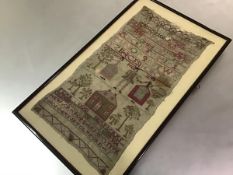 An 18th century needlework sampler, worked in coloured threads with a gentleman and two ladies in