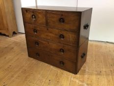 A mid-19th century mahogany campaign chest, in two sections, each with metal carrying handles,