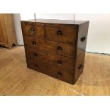 A mid-19th century mahogany campaign chest, in two sections, each with metal carrying handles,