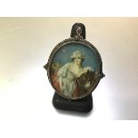 A Continental silver mounted portrait miniature brooch/pendant, late 19th century, oval, depicting a