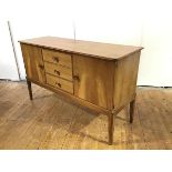 A Gordon Russell of Broadway sideboard, retailed by Heal's of London, the rectangular top with