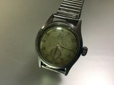A vintage Tudor Oyster (Rolex) stainless steel gentleman's wristwatch, the circular dial with gilt
