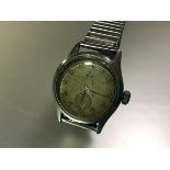 A vintage Tudor Oyster (Rolex) stainless steel gentleman's wristwatch, the circular dial with gilt