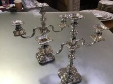 A pair of silver three-light candelabra in the Georgian taste, Roberts & Belk, Sheffield, 1974, each