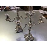 A pair of silver three-light candelabra in the Georgian taste, Roberts & Belk, Sheffield, 1974, each