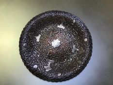 A fine quality Islamic dish, circular, probably bronze with a copper/gold patina, elaborately