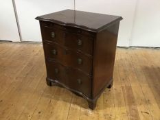 A French 19th century mahogany serpentine chest, the moulded rectangular top above a slide and three