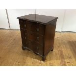 A French 19th century mahogany serpentine chest, the moulded rectangular top above a slide and three