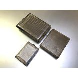 A group of silver cigarette cases comprising: a George V case, S. Blanckensee & Son Ltd,
