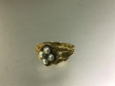 A William IV 18ct gold diamond and pearl set ring, with rare hallmarks for London 1835, centred by