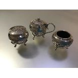 An Egyptian silver three piece condiment set, each piece hallmarked, c. 1930, comprising salt,