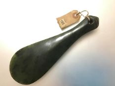 A Maori (New Zealand) jade mere club or patu, of leaf shape, with three grooves to the handle and