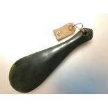 A Maori (New Zealand) jade mere club or patu, of leaf shape, with three grooves to the handle and