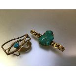 A modernist 9ct gold and turquoise brooch, hallmarked for PJD, Edinburgh 2001, centred by a
