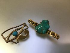 A modernist 9ct gold and turquoise brooch, hallmarked for PJD, Edinburgh 2001, centred by a