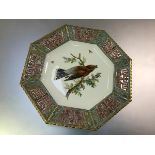 A French porcelain cabinet plate in the Aesthetic taste, c. 1880, octagonal, painted to the well