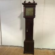 A George III inlaid mahogany longcase clock, the brass square 12" dial with Roman numerals,