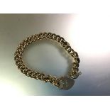 A late Victorian 9ct gold curblink bracelet with heart padlock clasp, the clasp hallmarked for