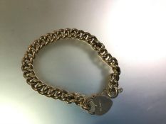 A late Victorian 9ct gold curblink bracelet with heart padlock clasp, the clasp hallmarked for