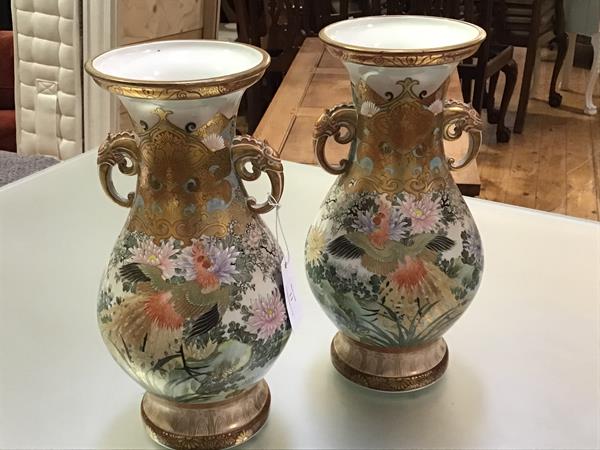 A pair of striking Kutani porcelain vases, Meiji period, c. 1900, each of baluster form with