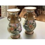 A pair of striking Kutani porcelain vases, Meiji period, c. 1900, each of baluster form with