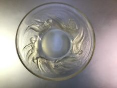 A Lalique opalescent glass bowl ouverte in the Ondines pattern, etched mark "R. LALIQUE FRANCE"