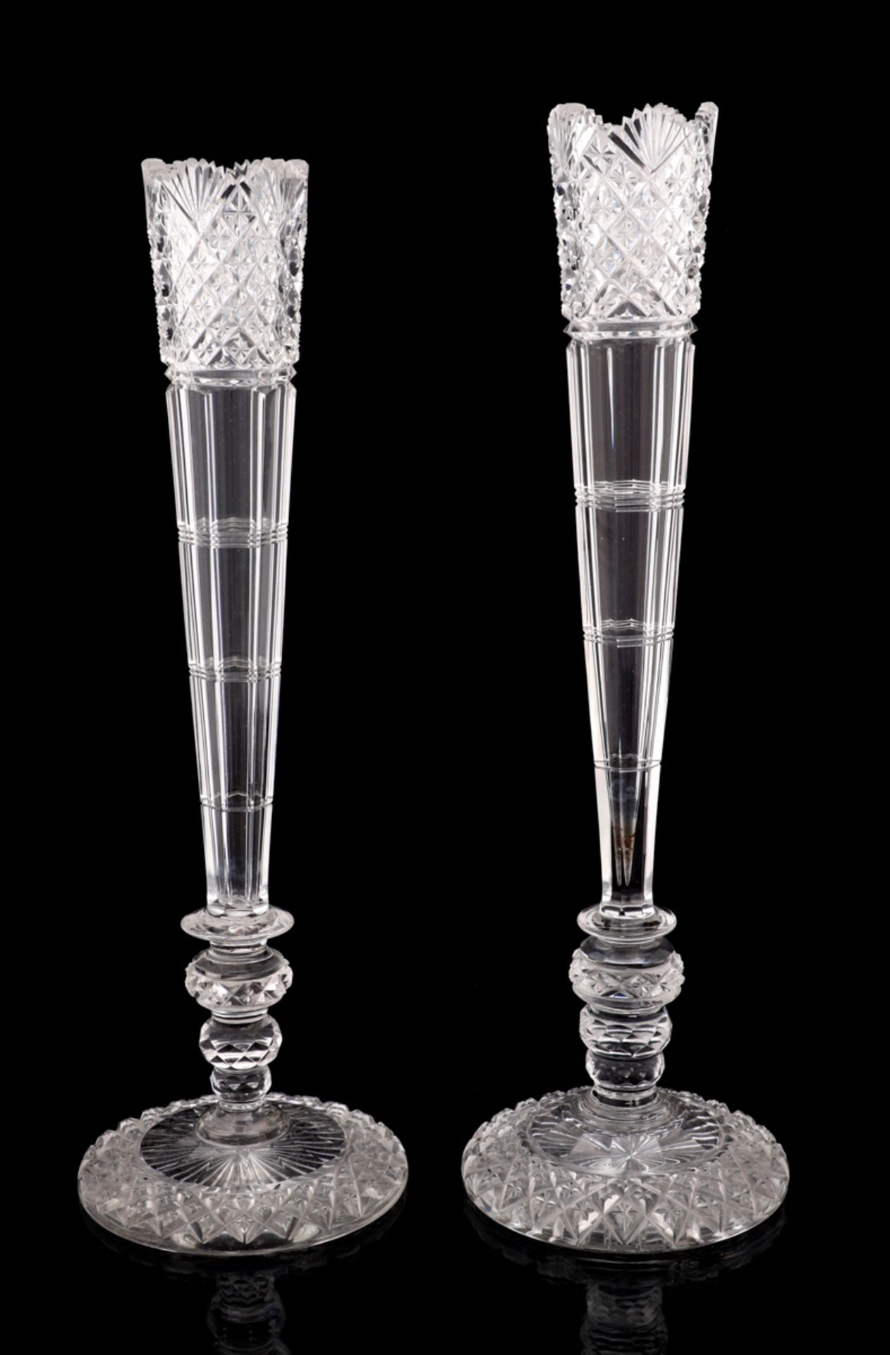 A PAIR OF BACCARAT SOLITAIRES Cut-crystal, possibly Baccarat. Slight differences. Height: 35.5 cm.