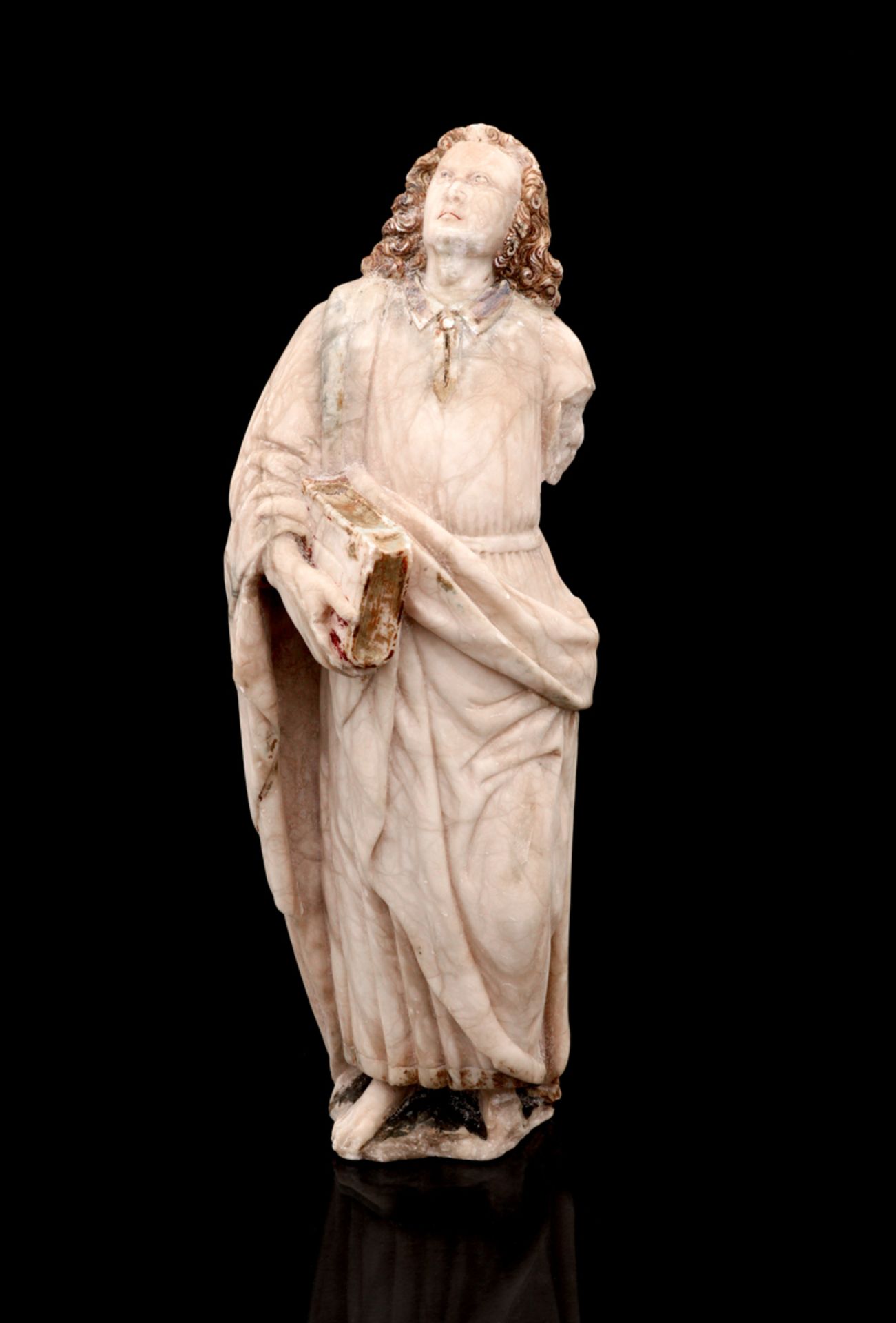 SAINT JOHN THE EVANGELIST, A 17TH CENTURY ALABASTER SCULPTURE Alabaster sculpture, traces of