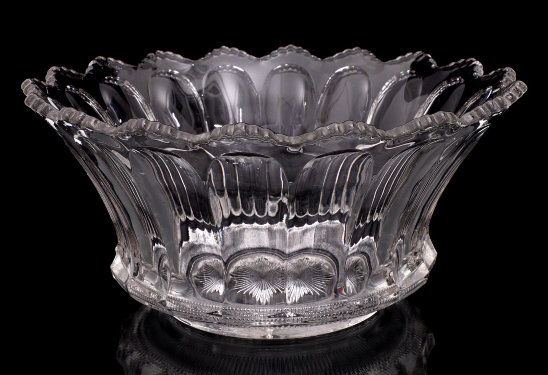 A LARGE IRISH GLASS BOWL Molded Irish glass, scalloped shape, with initial "H". Diam.: 38 cm.