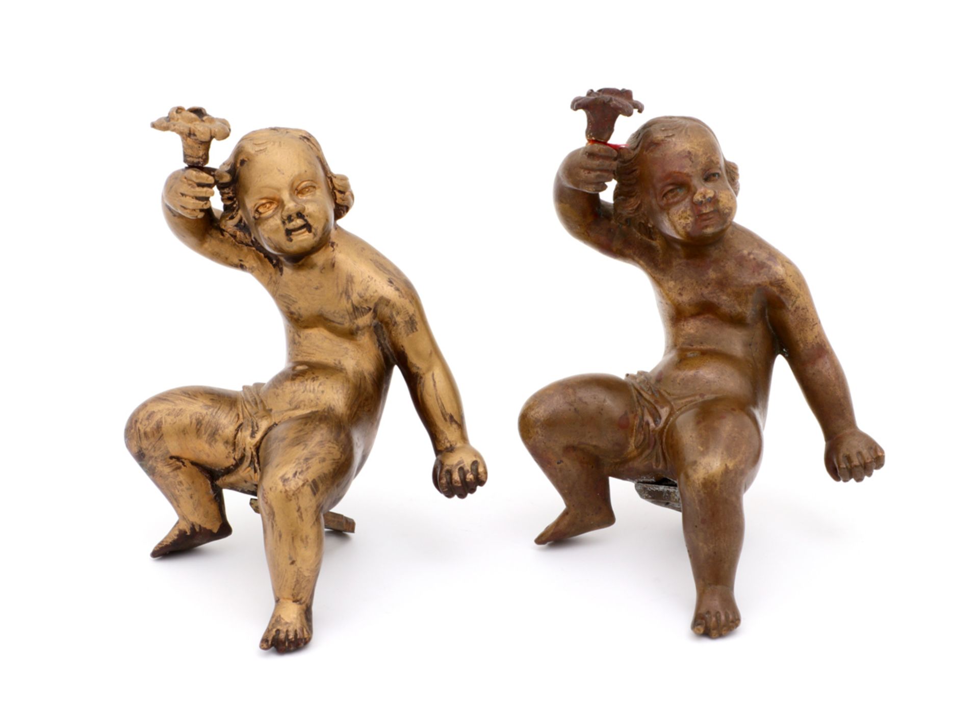 A PAIR OF BOOK ENDS - PUTTI Bronze. France, 19th Century. Signs of wear. Height: 13.5 cm.