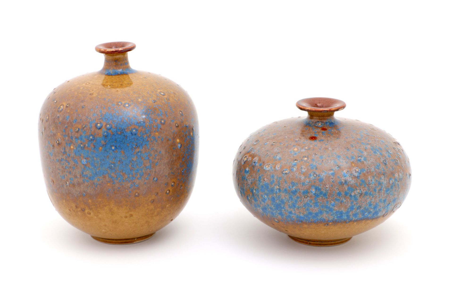 A PAIR OF VASES French ceramic, 1950s, decoration in yellow, blue and brown shades. Marked.