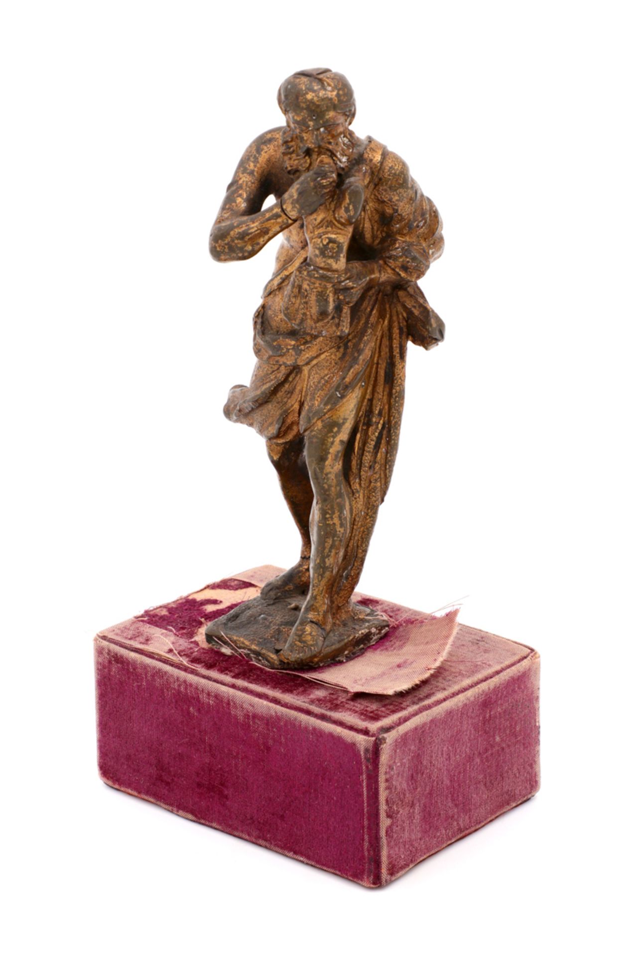 SATURN EATING HIS SON Bronze sculpture. Red velvet lined stand. Italy, late 17th Century. Height: 14