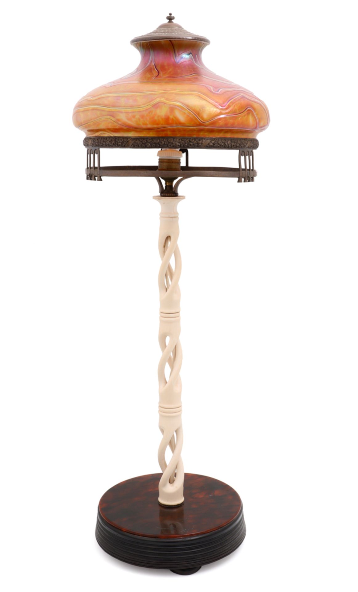 A TABLE LAMP Ivory structure, Löetz abajour, decoration "phenomene", ebonized wood base imitating