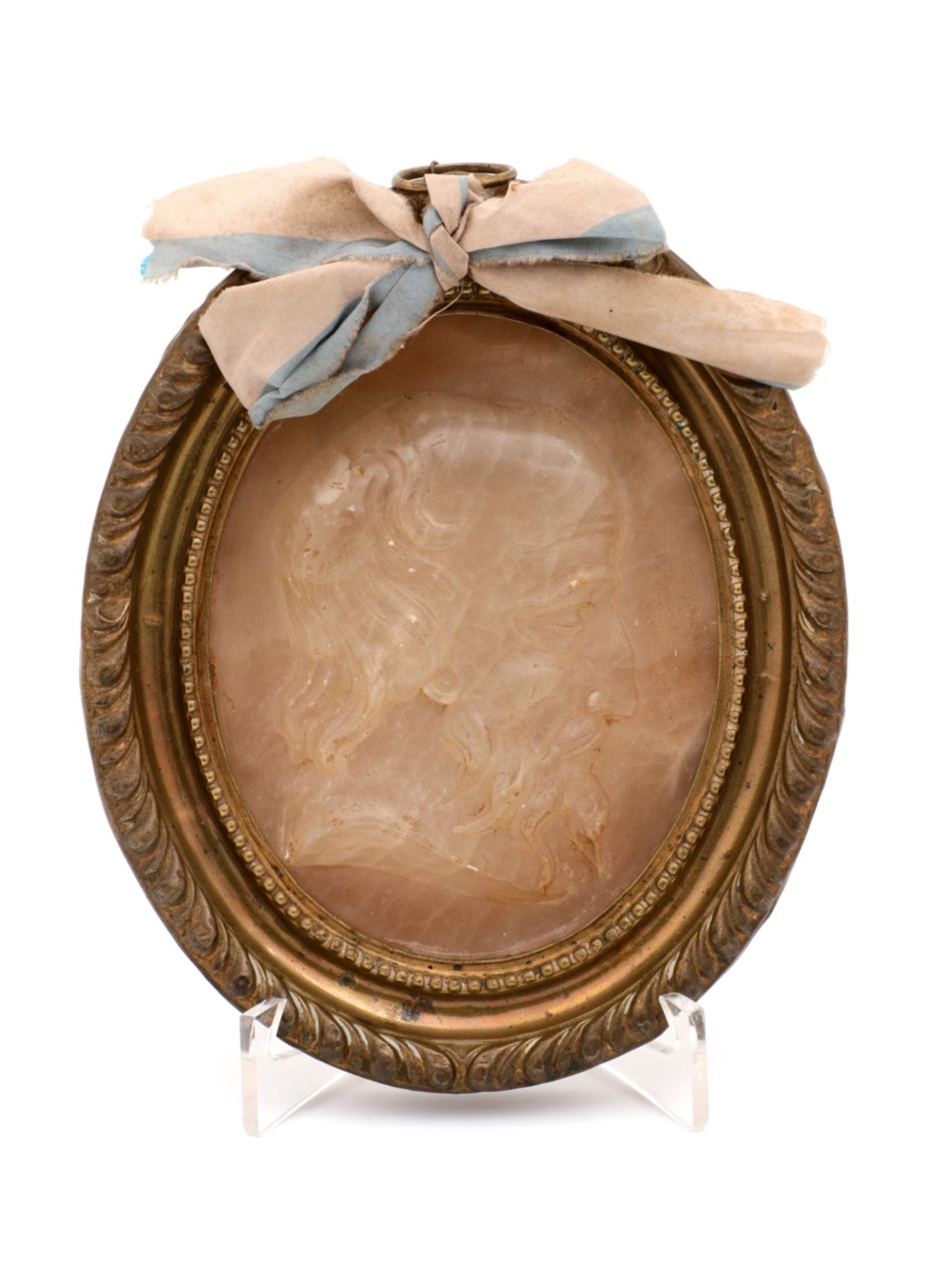 A QUARTZ MEDALLION DEPICTING A PHILOSOPHER Rose quartz, depicting head of a philosopher, frame in