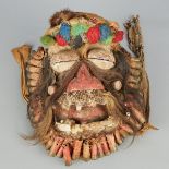 West African Mask with Shotgun Shells Kran We