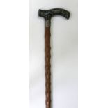 SpazierstockUm 1900. Brauner Schuss aus Wurzelholz, sog. Knoten - Stock. Griff aus Horn in