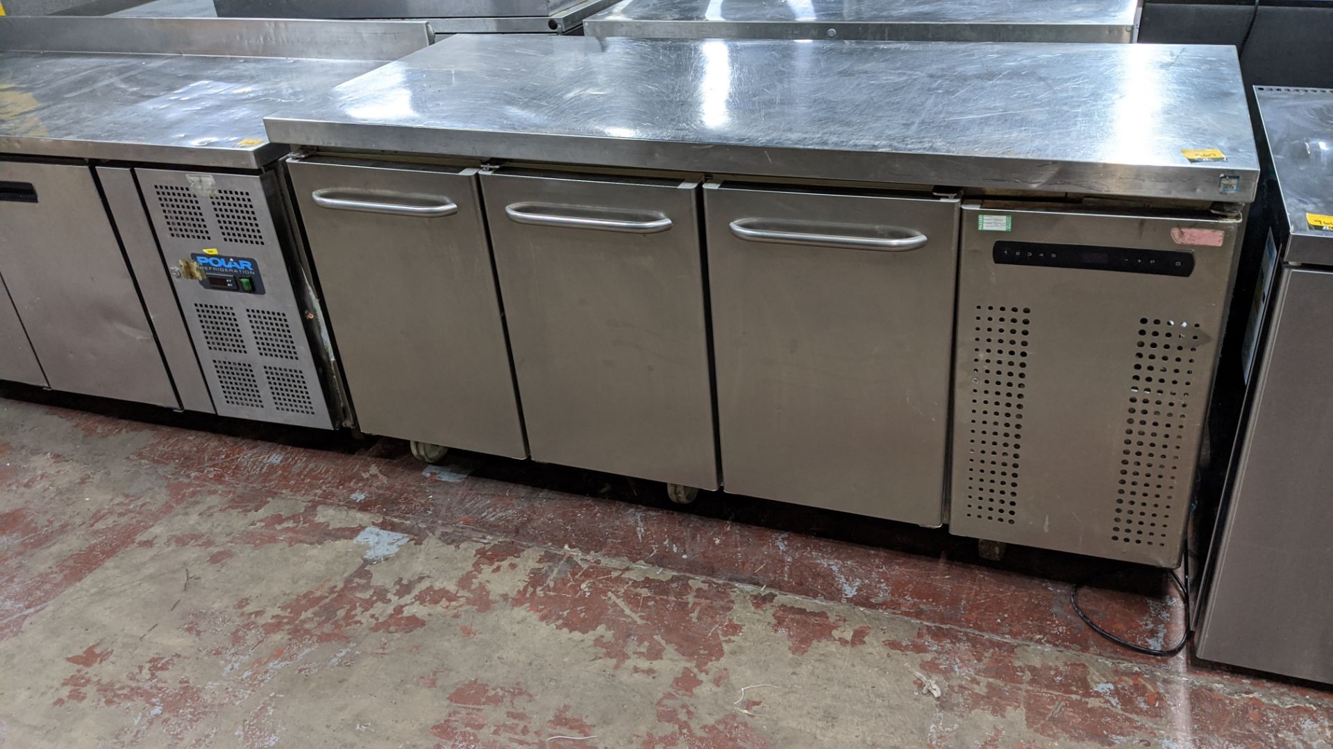 Large mobile triple door stainless steel refrigerated prep unit. IMPORTANT: Please remember goods